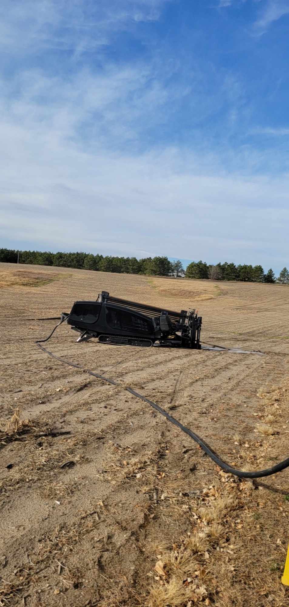 Ditch Witch directional drill installing a waterline near Fergus Falls, Minnesota